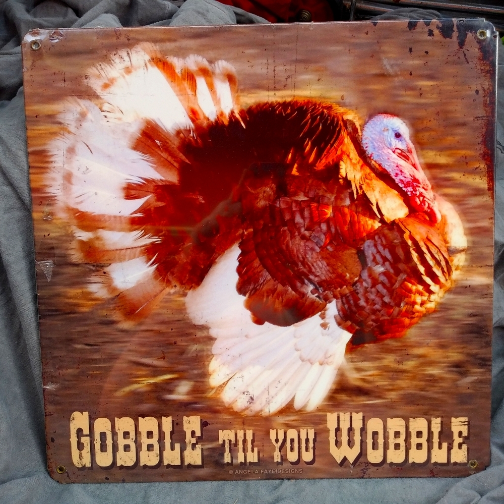 Gobble Til You Wobble metal sign